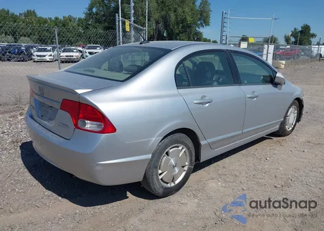 2010 Honda Civic Hybrid from USA, damaged, VIN JHMFA3F25AS004549
